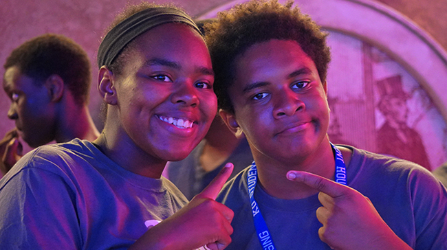 African American boy and girl celebrating at a party.